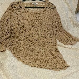 Dress Barn 100% acrylic, with the feel of cotton.  Crocheted sweater